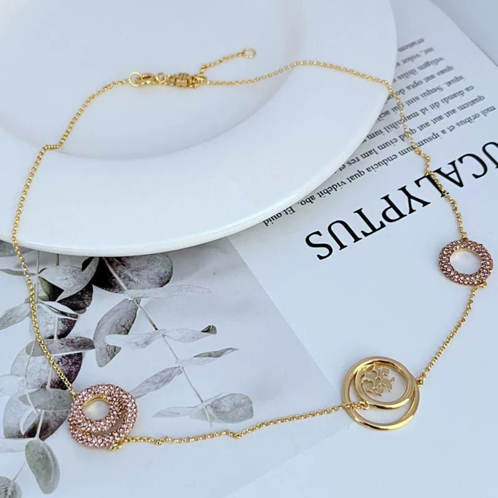 Tory Burch Rhinestone Geometric Round Necklace - Picture 4 of 7